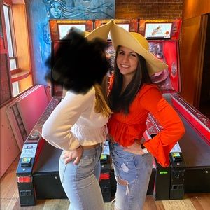 Floppy hat with adjustable rim. Has only been worn once